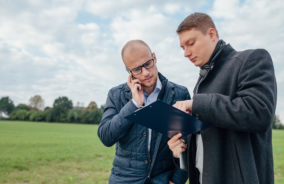 a prospective landowner asking an estate agent questions