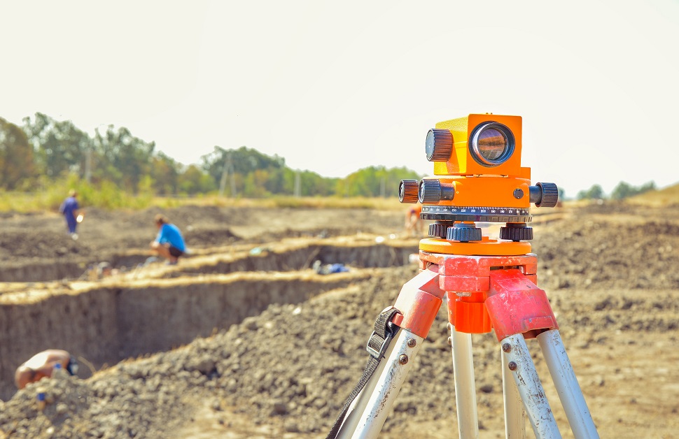 a total station used for an archaeological survey on a development site
