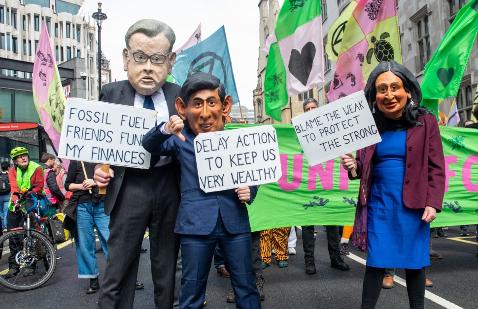 Protesters wearing Gove, Sunak and Braverman masks opposing delay to biodiversity net gain mandate