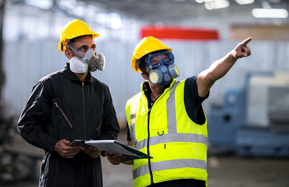 Two consultants discussing observations during an odour assessment