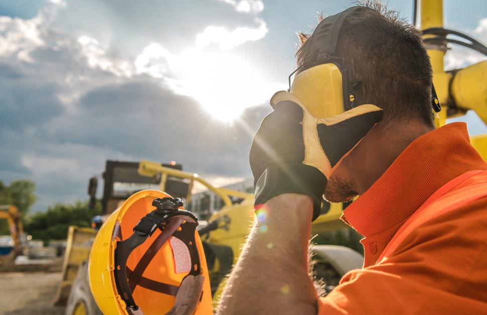 earmuffs being worn by construction workers