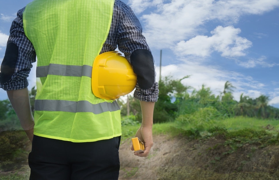 A land surveyor seeing the views of a site for a visual impact assessment