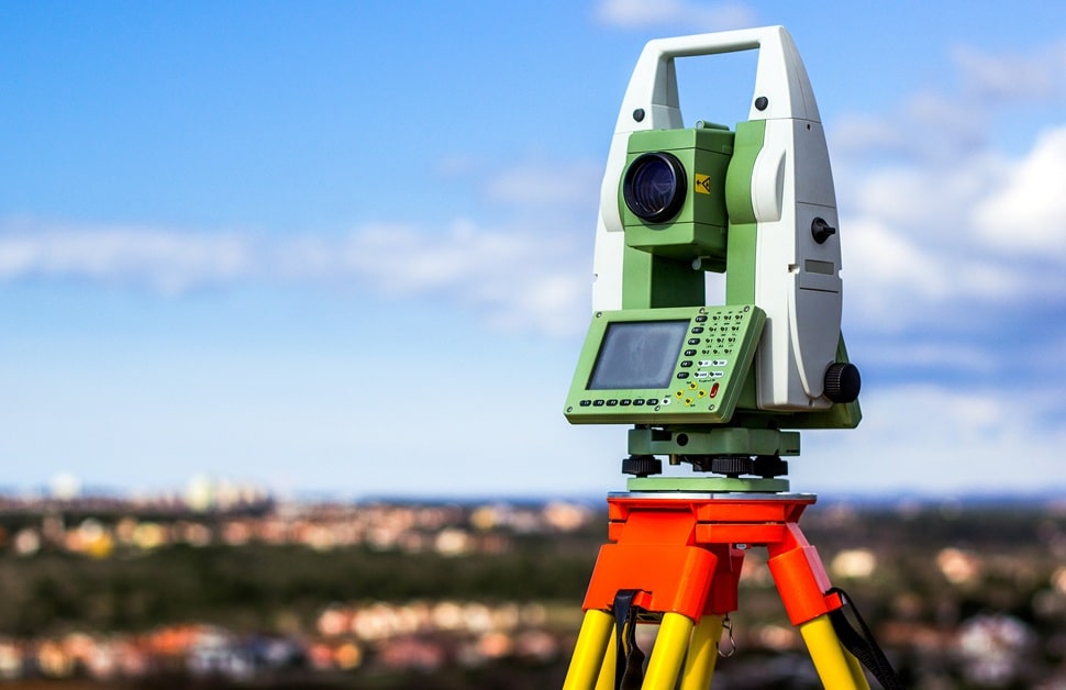A total station on a site being used to carry out a 3D survey