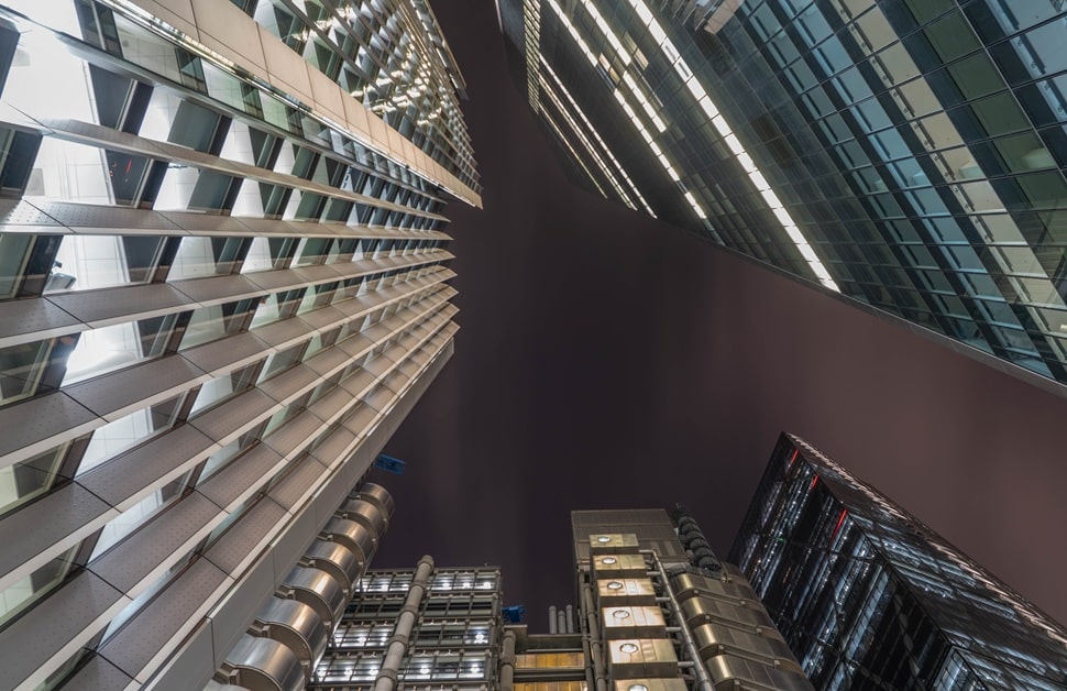 dark sky-compliant lighting seen across multiple buildings in a city at night