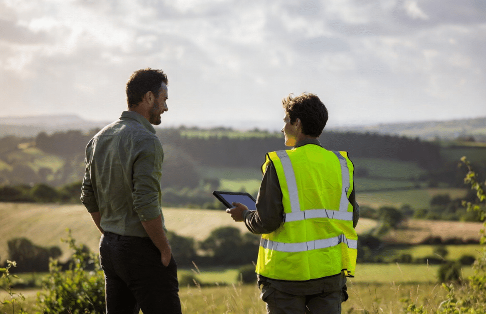 A developer and an ecologist discussing planning policy