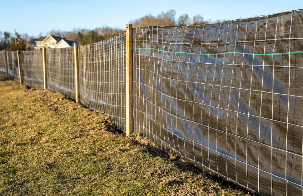 wildlife-friendly fencing made from silt and situated across a development site to support protected species