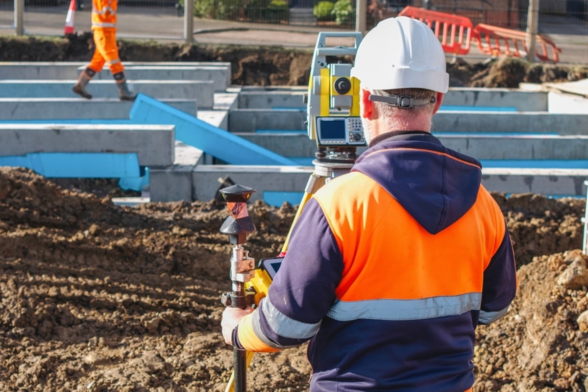 A planning consultant checking site levels.