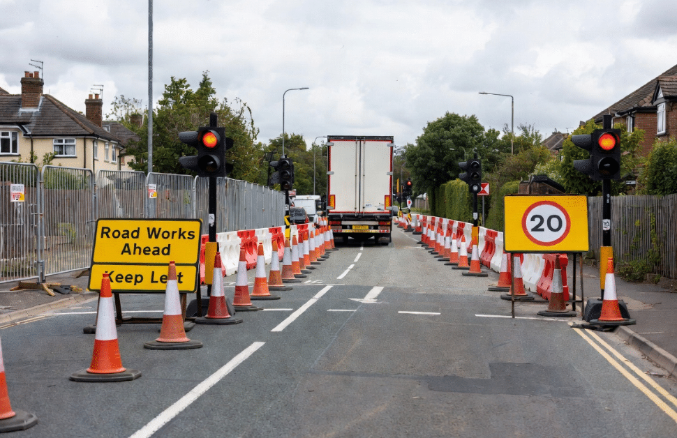 a lorry driving down a safely redirected street based on the instructions of a construction traffic management plan (CTMP)