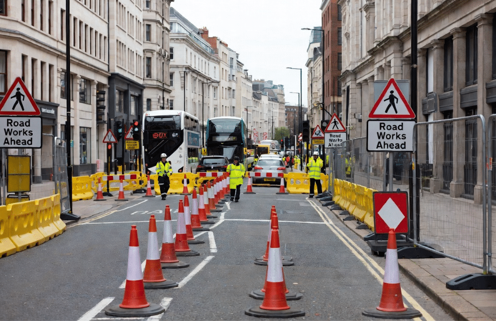 an urban street closed off, based on the instructions from a traffic management plan (TMP)