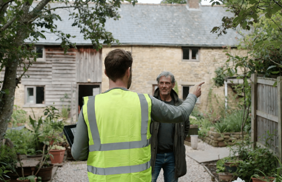 An ecological consultant discussing conservation covenants and biodiversity gain site registration with a landowner